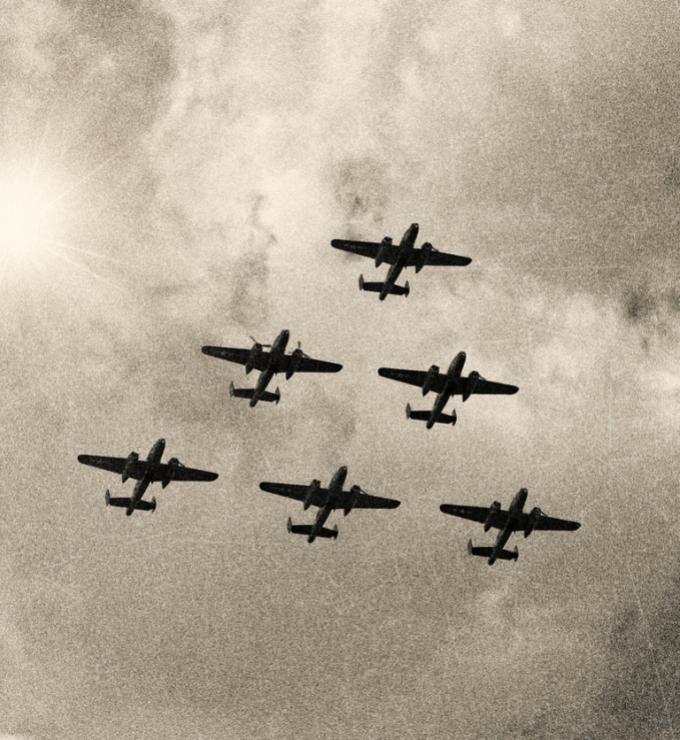 WW2 Mitchell B-25 Medium Bombers flying in V-Formation stock photo