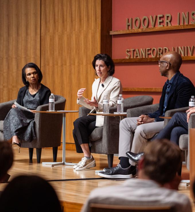 Hoover Institution Director Condoleezza Rice, Former US Commerce Secretary Gina Raimondo, Google-Alphabet executive James Manyika and Former UK Prime Minister and Hoover Distinguished Visiting Fellow Rishi Sunak are seen in Hauck Auditorium on March 17, 2026. (Patrick Beaudouin)