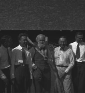 Ivan Pavlov and associates posing for the camera during a brief pause from their game of gorodki.