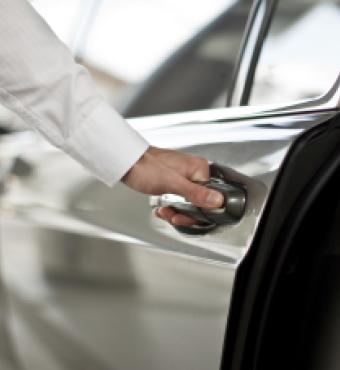 Man opening a car door