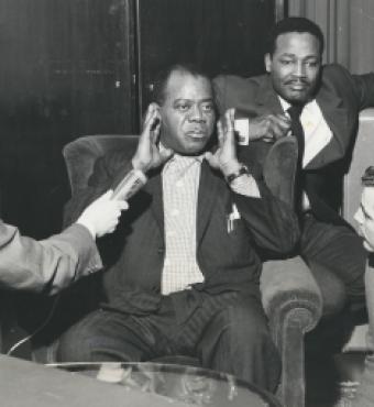 Louis Armstrong visits with Radio Liberty reporters