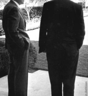 George Shultz and Richard Nixon