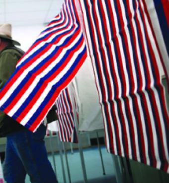 man leaves voting booth
