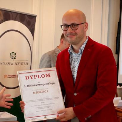 Photograph of Dr. Michał Przeperski receiving his dyploma