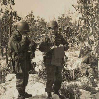 Rasula - sepia toned photo of 2 soldiers in the field