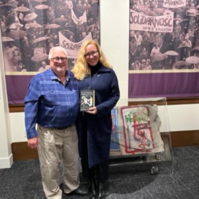 Richard Brown standing with Rebecca Donner in Hoover Tower Gallery