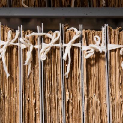 Cotton tied newspapers