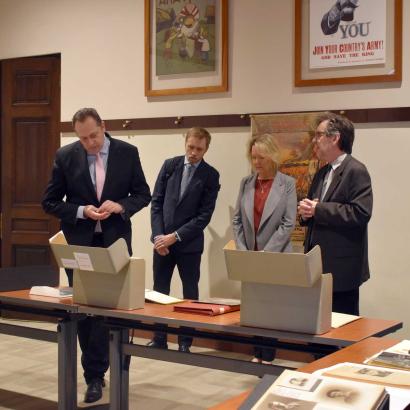 Latvian Ambassador delegation viewing library and archival material