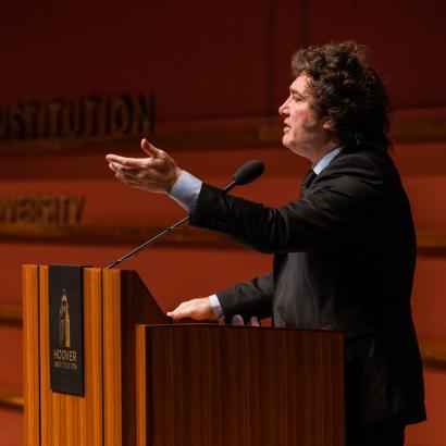 Argentine President Javier Milei gestures at the podium as he speaks in Hauck Auditorium on May 29, 2024.
