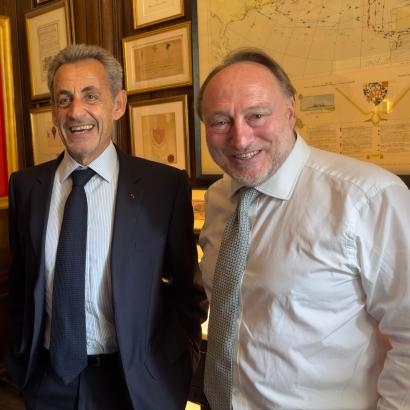 Carla Bruni, former French president Nicholas Sarkozy and Andrew Roberts are seen in London on June 4.
