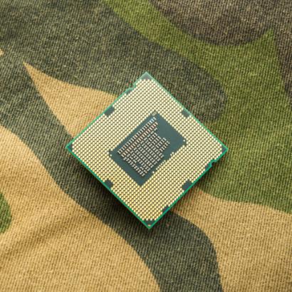computer chip on camo background