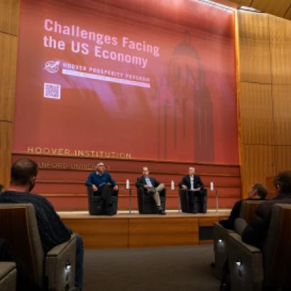 Emmanuel Saez (left), Bruce Meyer and Senior Fellow Ross Levine discuss income inequality at the Challenges Facing the US Economy Conference on January 21, 2025. (Patrick Beaudouin)