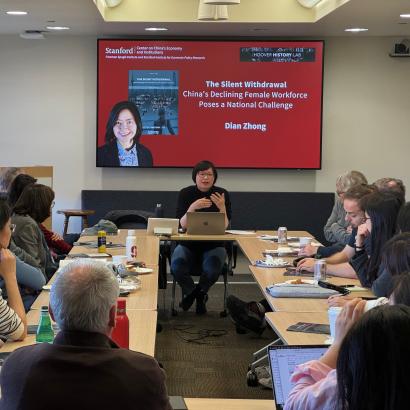 Dian Zhong speaking at an event