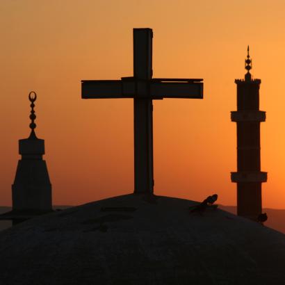 Egyptian sunrise with cross and crescents stock photo