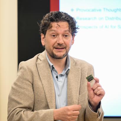 Simone D’Amico speaks to members of Congress and their staff members at an event at Stanford University on May 30, 2024. (Rod Searcey)