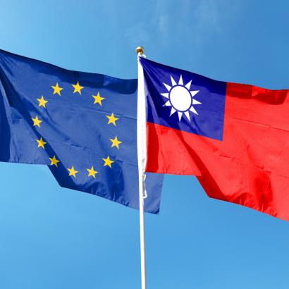 European Union flag and Taiwan flag on cloudy sky. waving in the sky stock photo