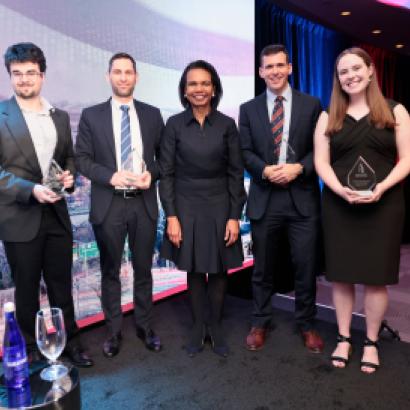 Winners of the 2025 HISPBC Student Essay Competition stand with Hoover Institution Director Condoleezza Rice on February 22, 2026. (Eric Draper)