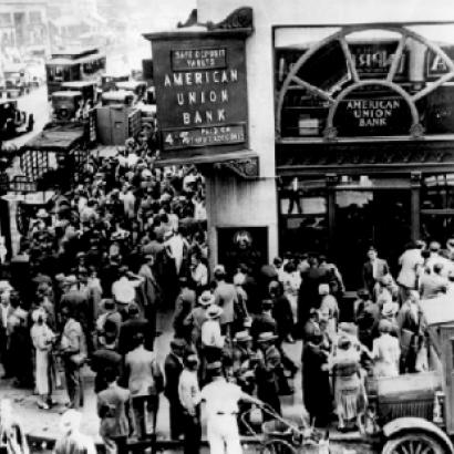 Crowd at New York's American Union Bank during a bank run early in the Great Depression.