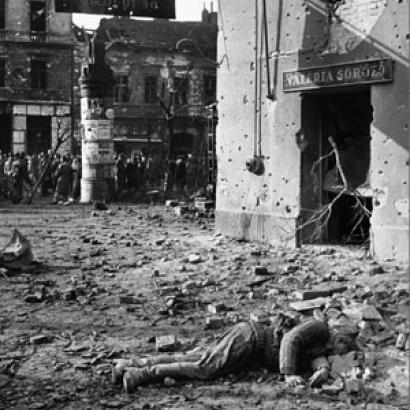 Hungarians with dead Soviet soldier in 1956 uprising