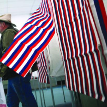 man leaves voting booth