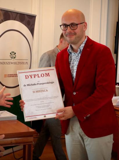 Photograph of Dr. Michał Przeperski receiving his dyploma
