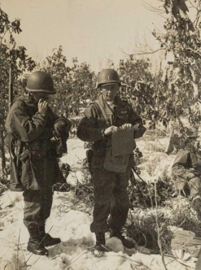 Rasula - sepia toned photo of 2 soldiers in the field