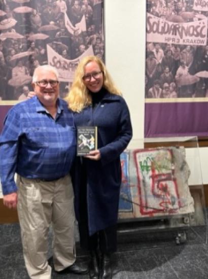 Richard Brown standing with Rebecca Donner in Hoover Tower Gallery