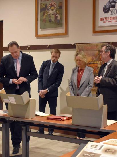 Latvian Ambassador delegation viewing library and archival material