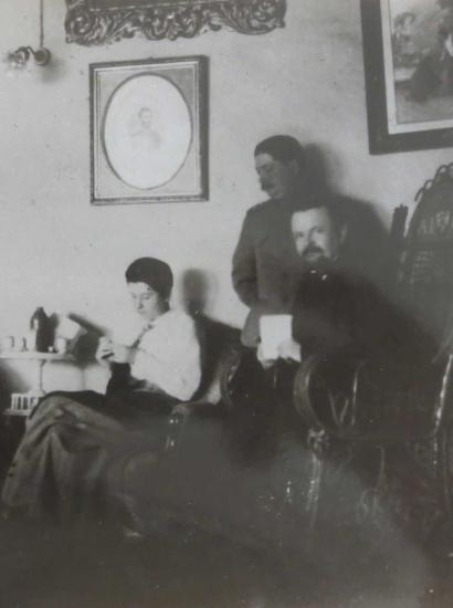 Trubetskoi with group in a sitting room
