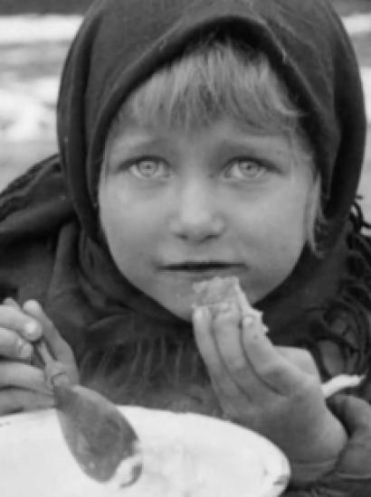 Screencapture of Tsaritsyn girl from film "America's Gift to Famine-Stricken Russia" (1922)