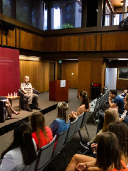 Amy Zegart (left) and General Paul Nakasone in a fireside chat at the Hoover Institution with an audience of Stanford University students.