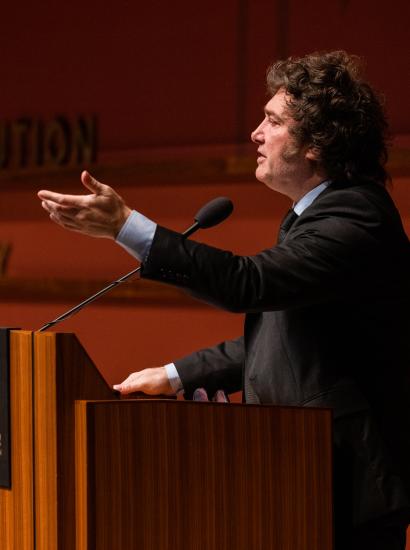 Argentine President Javier Milei gestures at the podium as he speaks in Hauck Auditorium on May 29, 2024.
