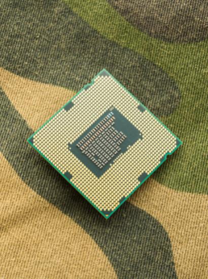 computer chip on camo background