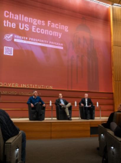 Emmanuel Saez (left), Bruce Meyer and Senior Fellow Ross Levine discuss income inequality at the Challenges Facing the US Economy Conference on January 21, 2025. (Patrick Beaudouin)