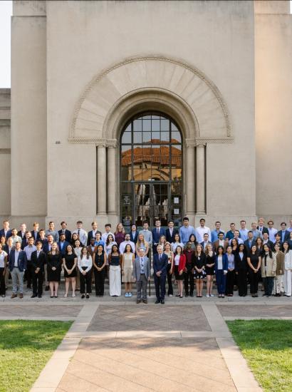 Students who participated in the 2025 Hoover Institution Summer Policy Boot Camp stand before Hoover Tower on August 10, 2025. (Patrick Beaudouin)