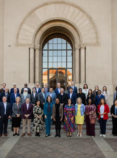 Participants in a joint Hoover–National Association of Counties gathering stand in front of Hoover Tower on December 8, 2025. (Patrick Beaudouin)