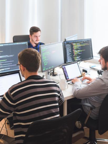 Software developing team working in the office stock photo