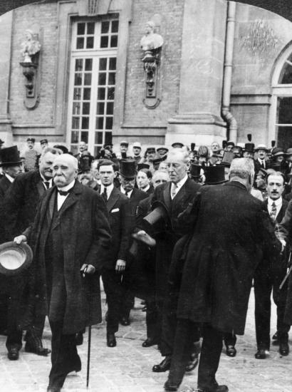 1919: French prime minister Georges Clemenceau (1841 - 1929) (L), US president Woodrow Wilson (1856 - 1924) (C) and British prime minister David Lloyd George (1863 - 1945) attend negotiations for the Treaty of Versailles. (Photo by Hulton Archive/Getty Images)