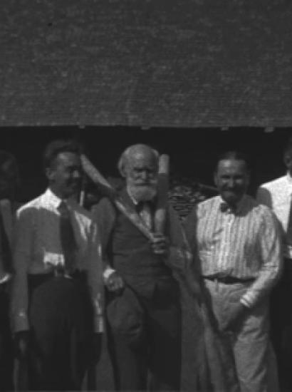 Ivan Pavlov and associates posing for the camera during a brief pause from their game of gorodki.