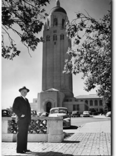 Former president Herbert Hoover poses with his namesake tower in August 1951.