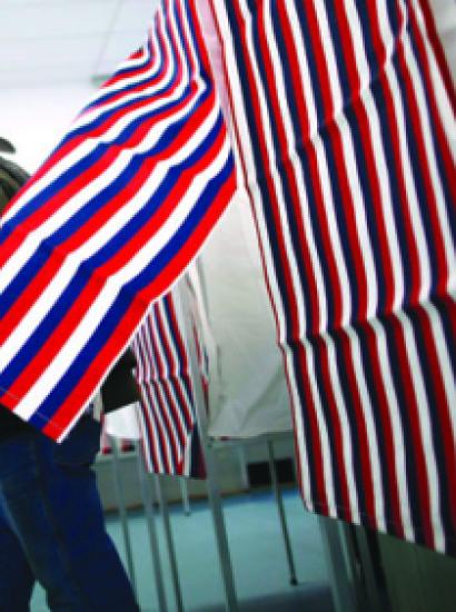 man leaves voting booth