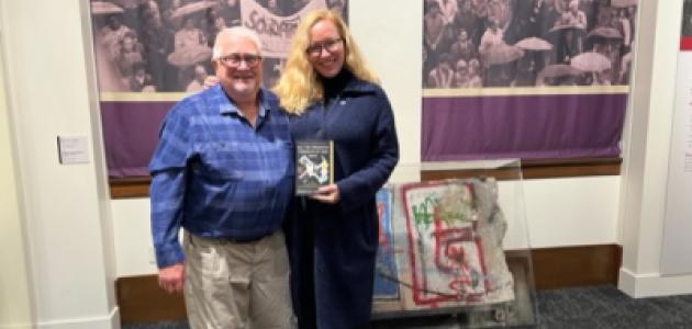 Richard Brown standing with Rebecca Donner in Hoover Tower Gallery