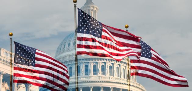 Capitol building with flags