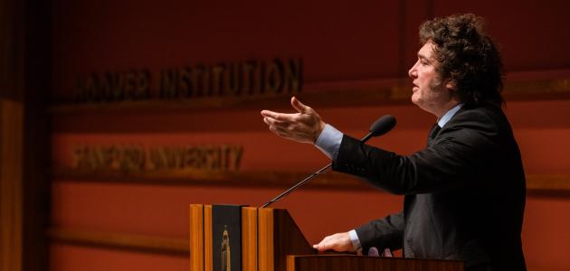 Argentine President Javier Milei gestures at the podium as he speaks in Hauck Auditorium on May 29, 2024.
