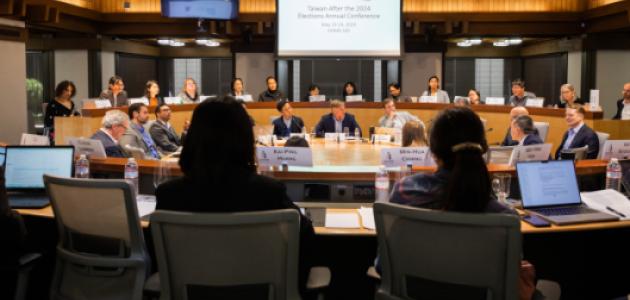 Scholars are seen discussing Taiwan’s future at the Hoover Institution on May 23, 2024. 
