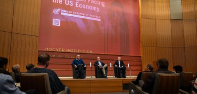 Emmanuel Saez (left), Bruce Meyer and Senior Fellow Ross Levine discuss income inequality at the Challenges Facing the US Economy Conference on January 21, 2025. (Patrick Beaudouin)