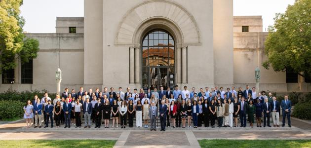 Students who participated in the 2025 Hoover Institution Summer Policy Boot Camp stand before Hoover Tower on August 10, 2025. (Patrick Beaudouin)
