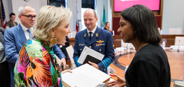 Hoover Institution Director Condoleezza Rice and Her Imperial and Royal Highness Princess Astrid of Belgium exchange a gift in the Annenberg Conference Room on October 7, 2025. (Patrick Beaudouin)