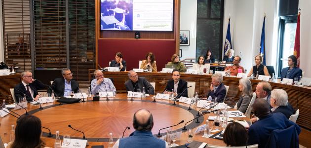 1.	Participants in the Promises and Challenges of Decentralized Governance conference are seen in the Annenberg Conference Room on November 6, 2025. (Patrick Beaudouin)