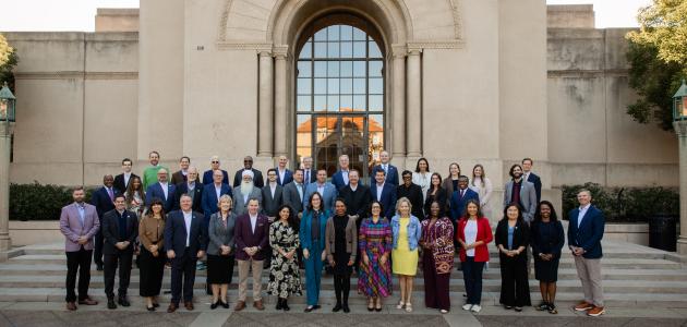 Participants in a joint Hoover–National Association of Counties gathering stand in front of Hoover Tower on December 8, 2025. (Patrick Beaudouin)